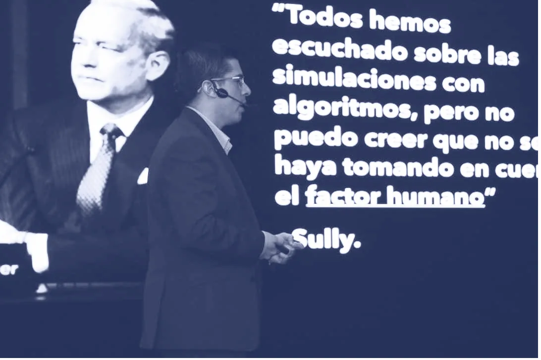Alex Servin at Universidad Rafael Landívar, with the human-factor quote on screen